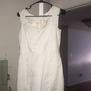 A cream colored dress.